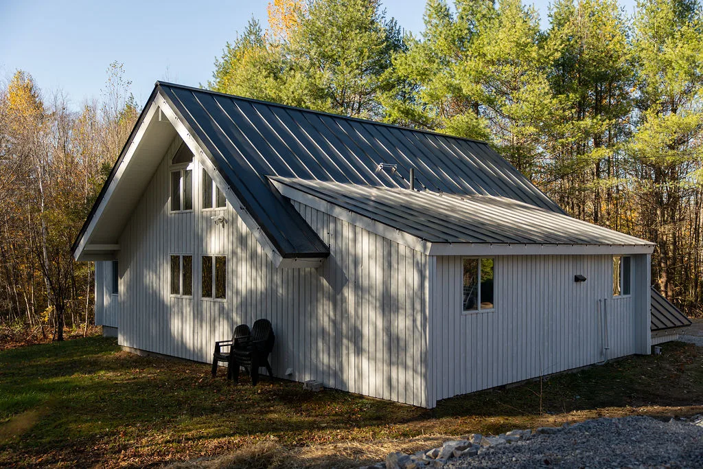 The A-frame from the side yard in autumn