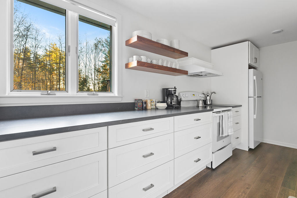 Beautiful chef's kitchen with floating shelves