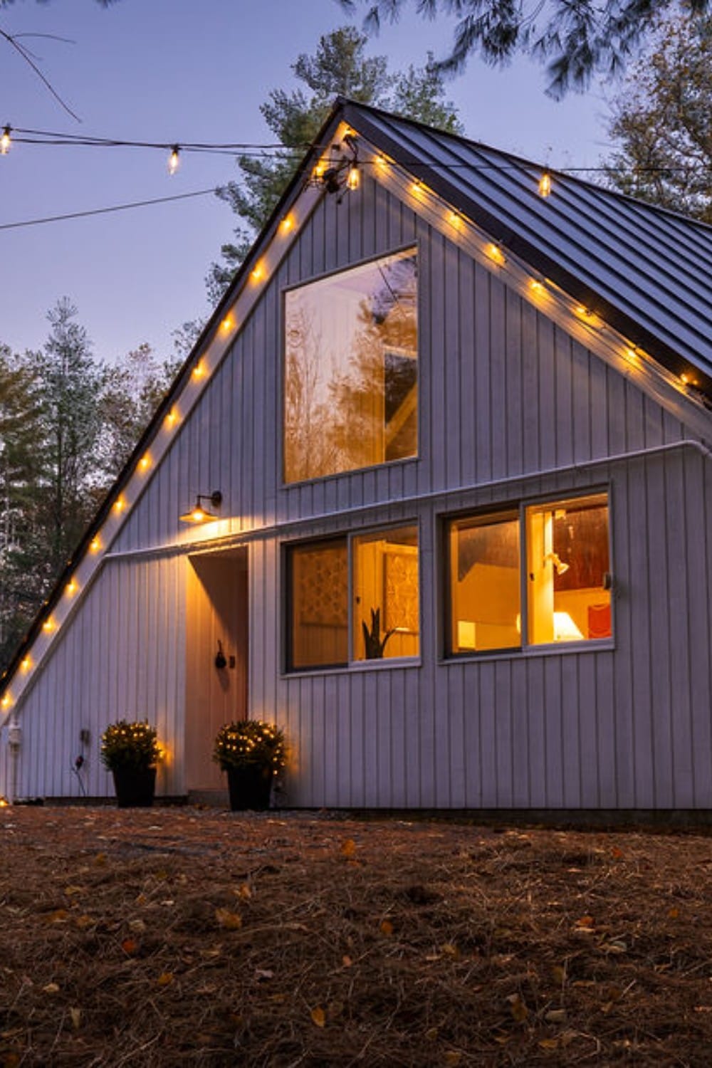 A-Frame Cabin at Twilight with String Lights