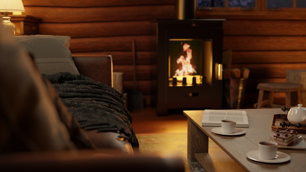 Cozy cabin living room with fireplace — an ideal feature to look for in a Stratton Mountain vacation rental